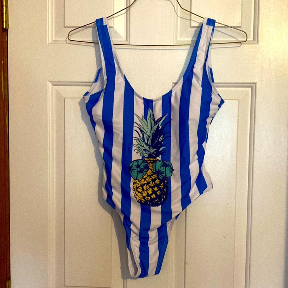 Cute pineapple swimsuit.